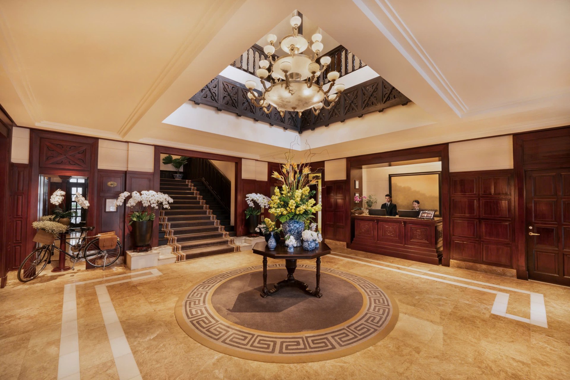 The Metropole’s marble lobby, its staircase and chandelier